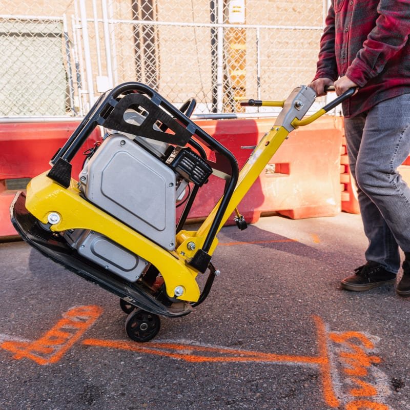 Tomahawk 6.5 HP Honda Reverse Hydraulic Plate Compactor for Soil, Aggregate, Cohesive Compaction - in-use view